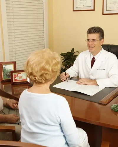 Home 5 Dr. Kevin Gallagher - With Patients in Office